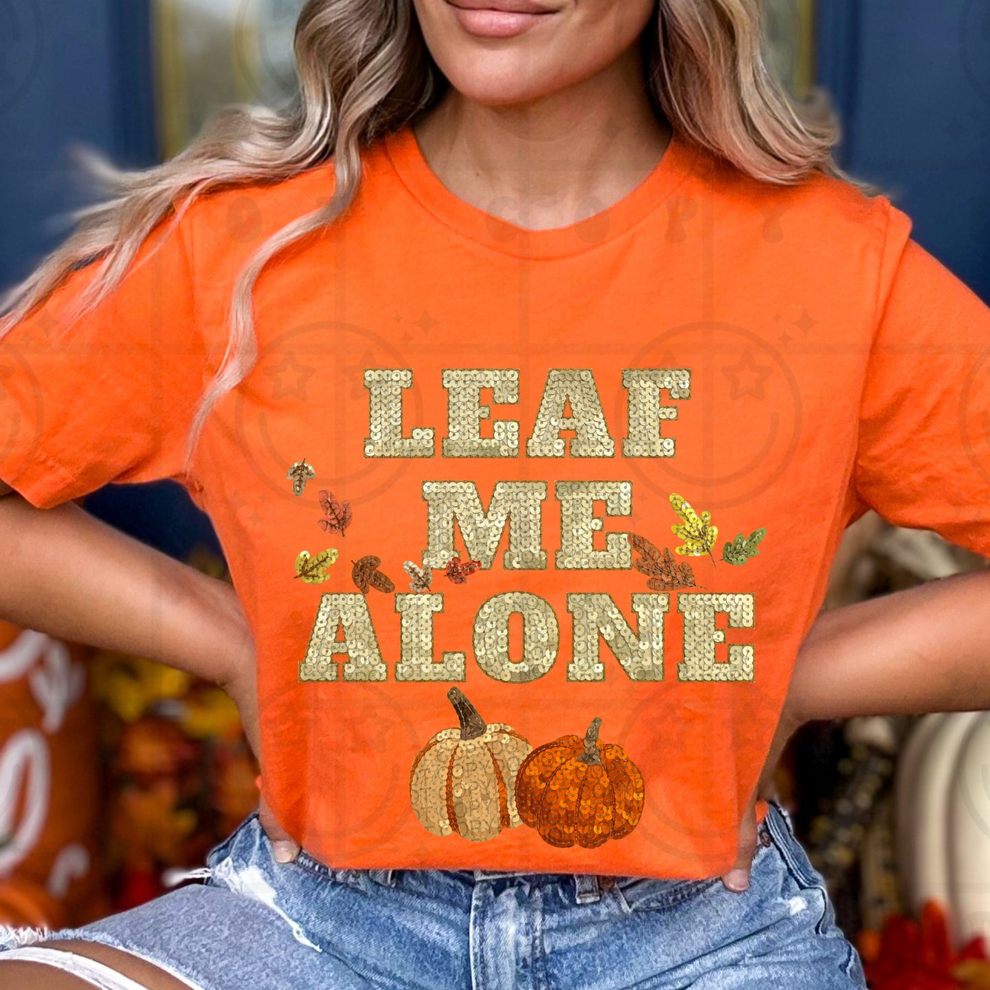 Leaf me alone fall faux sequin design shown on a shirt