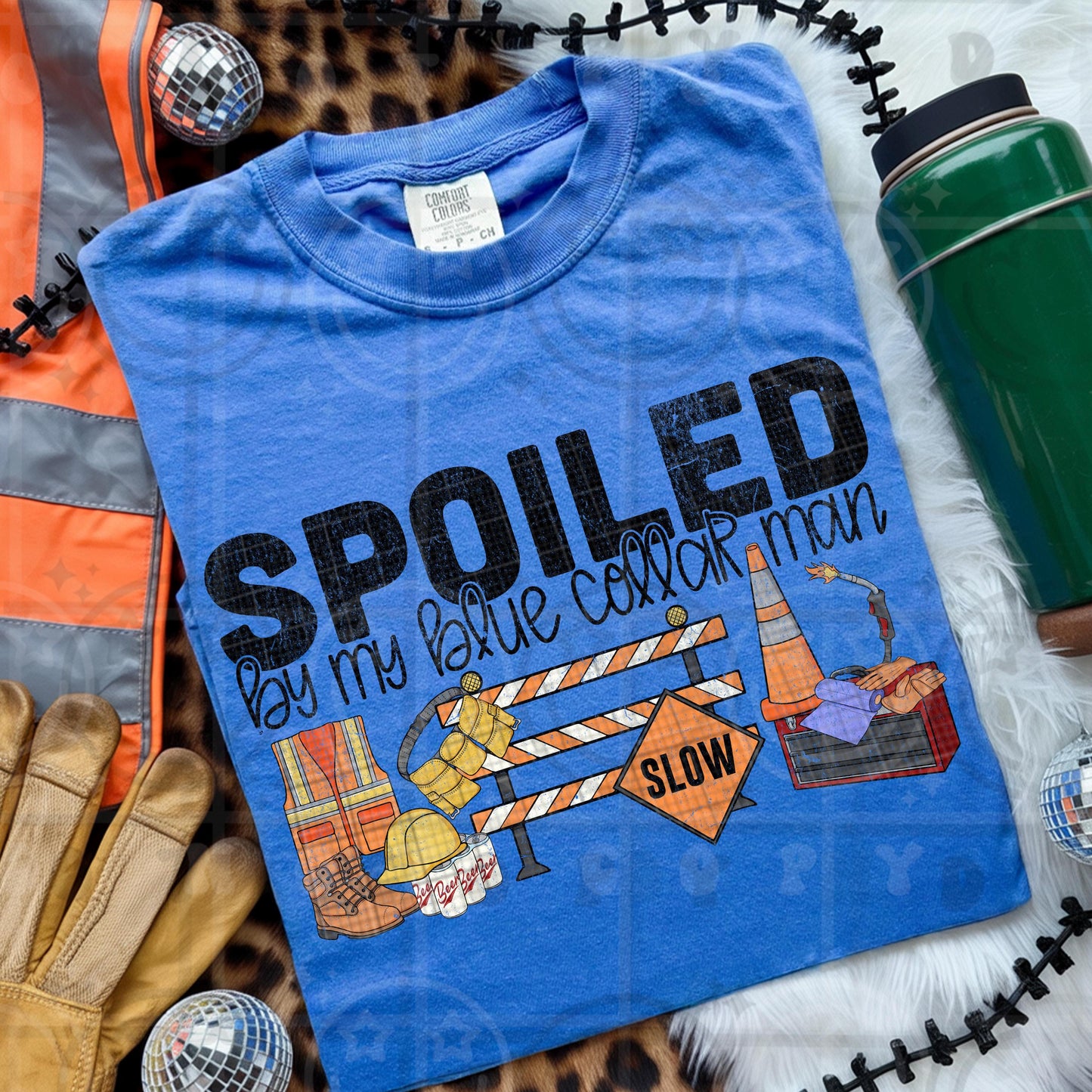 Spoiled by my blue collar man design with construction boots hard hat safety vest traffic barricade cones tools and lunch box on blue background