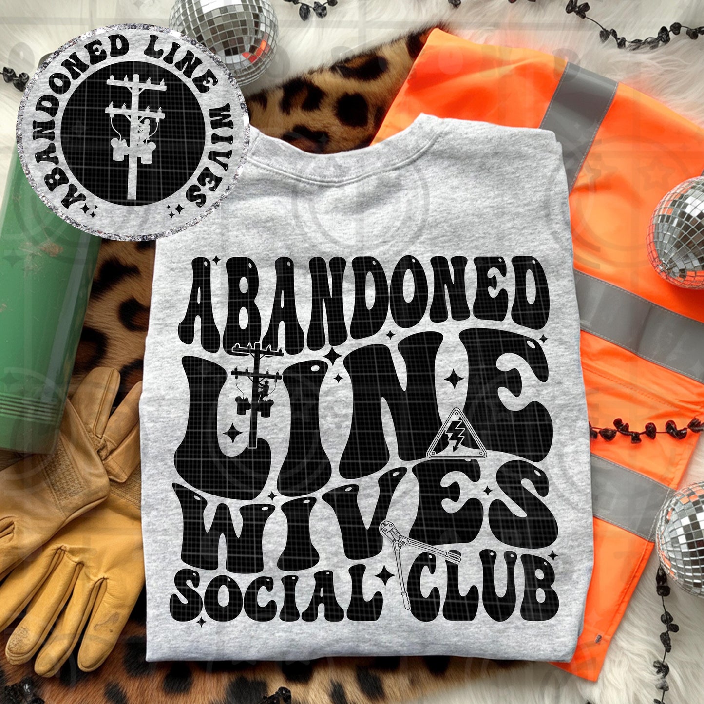 Abandoned line wives social club design with bold black retro lettering power pole and lineman tools on gray shirt