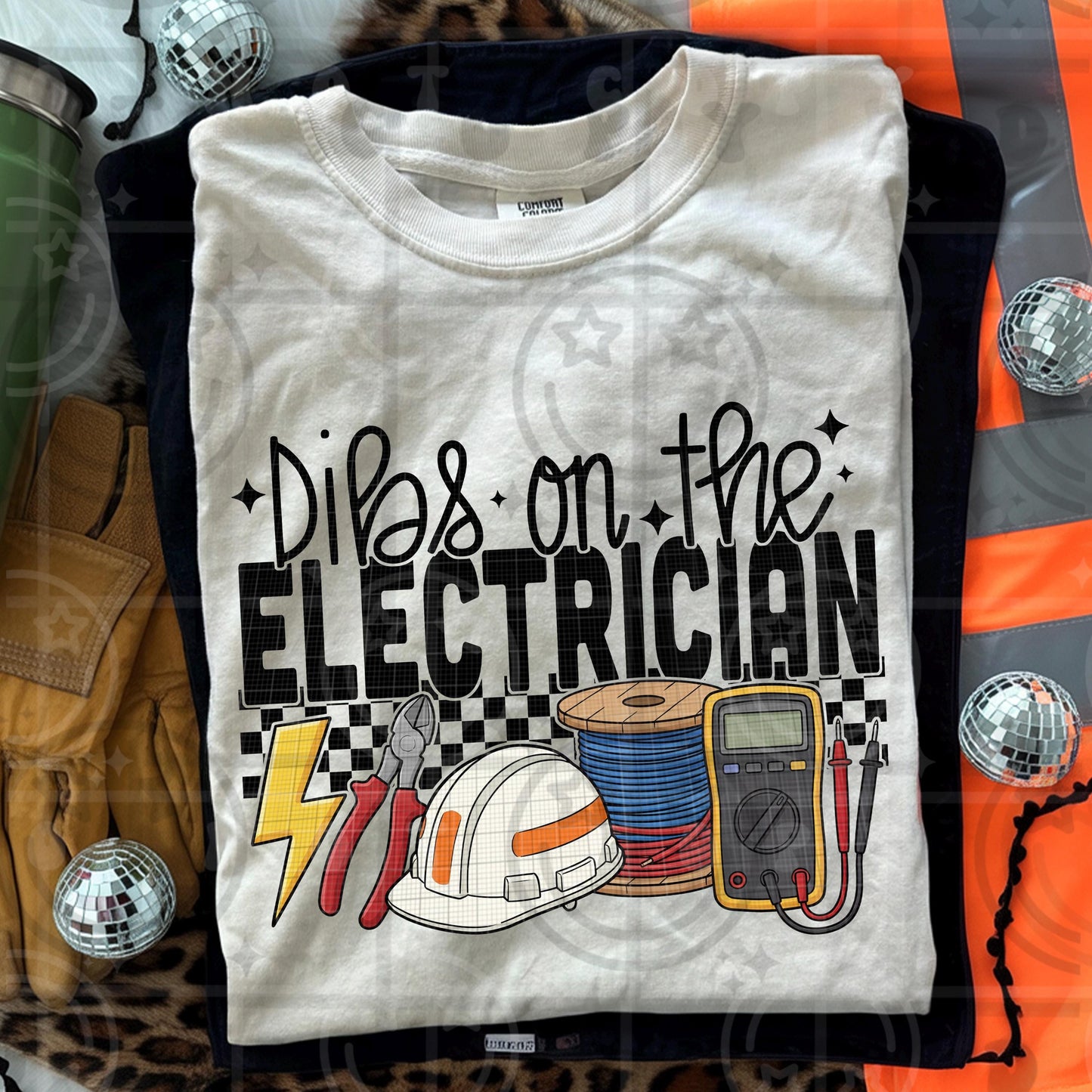 Electrician themed illustration with hard hat wire spool multimeter pliers lightning bolt and text reading dibs on the electrician