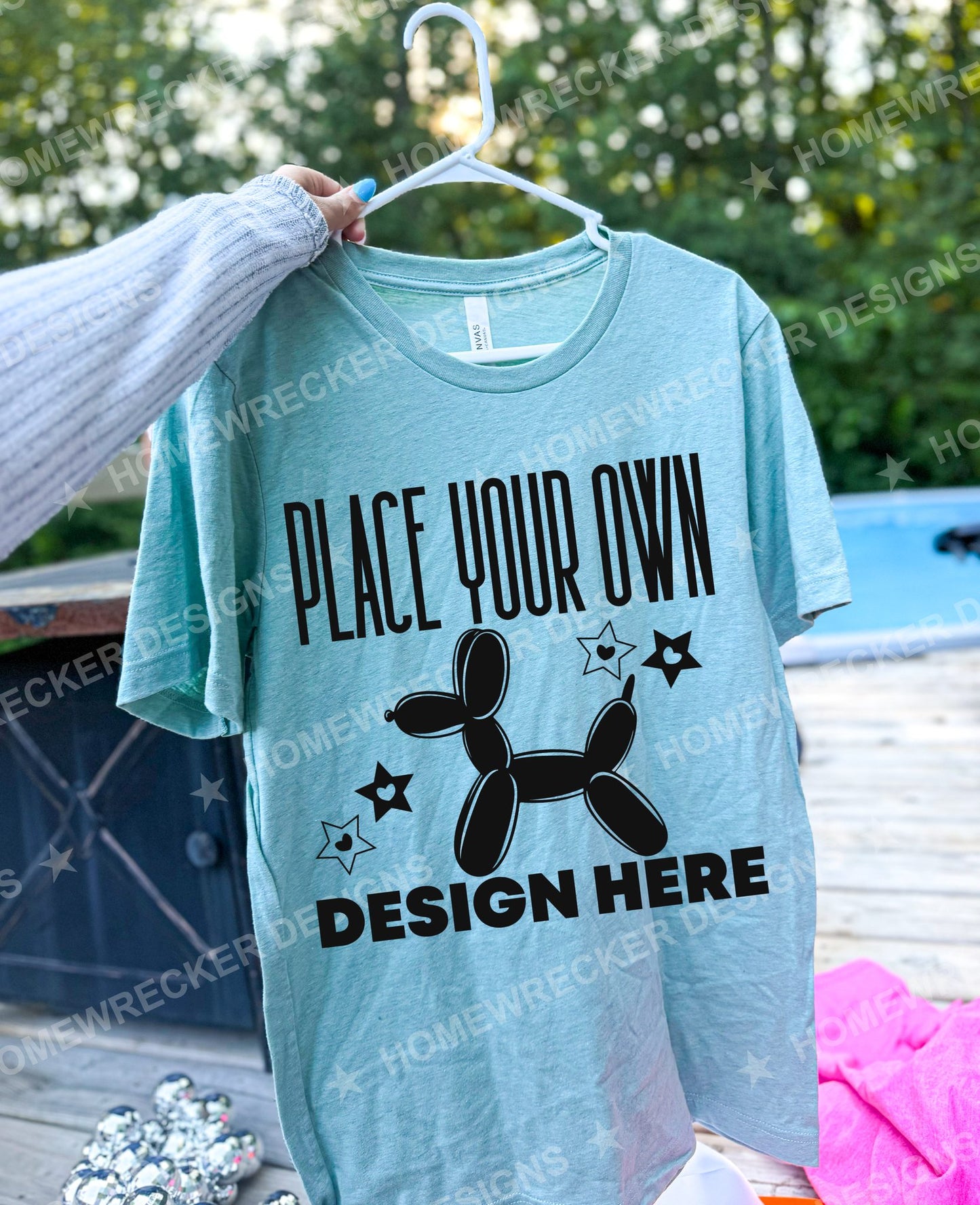 Blank Bella + Canvas 3001 t-shirt in Heather Prism Mint, hanging mockup photo from Homewrecker Design Shop