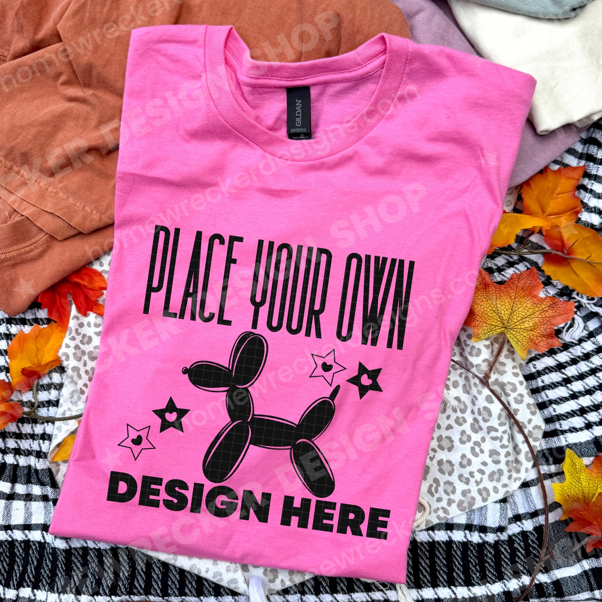 Blank Gildan 64000 Softstyle t-shirt in Azalea, fall styling, folded mockup photo from Homewrecker Design Shop