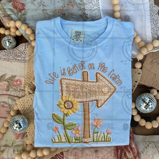 Life Is Better On The Farm faux embroidery style design with floral farm sign arrow sunflowers and cottagecore farmhouse details