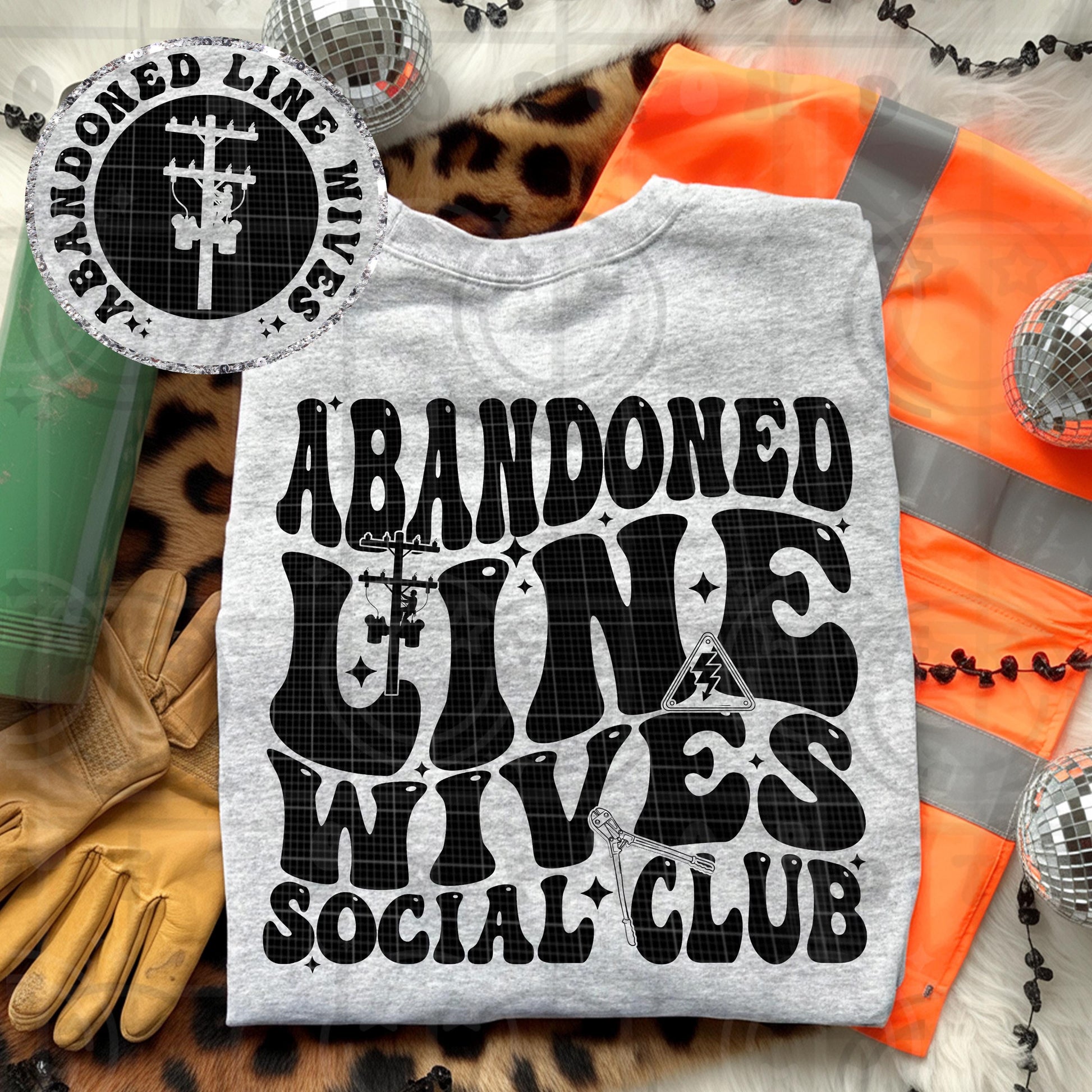 Abandoned line wives social club design with bold black retro lettering power pole and lineman tools on gray shirt